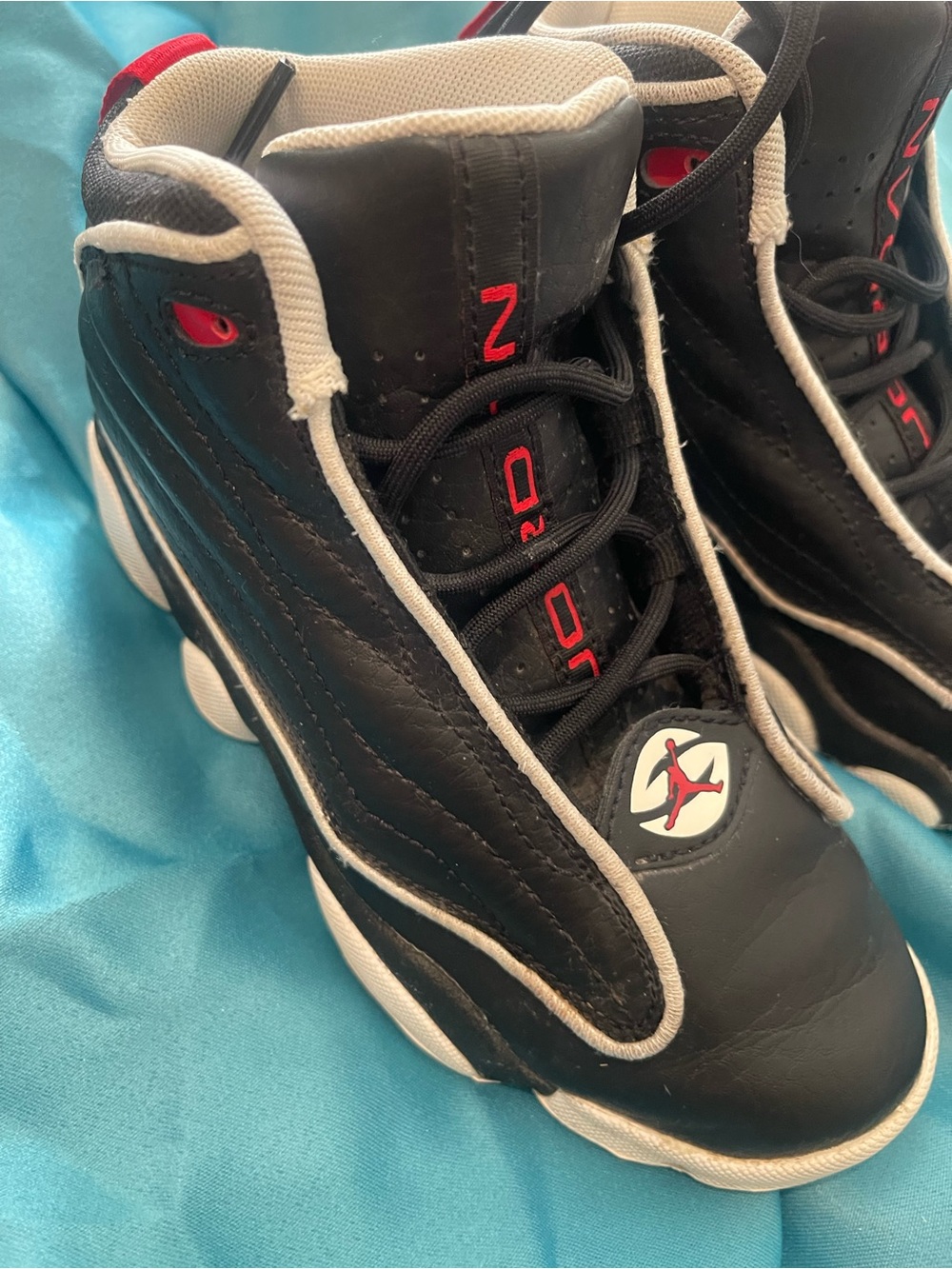 Jordan Kids Black and White Sneakers with Red Accents size 1Y